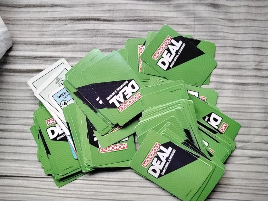Monopoly Deal Card Game – Swap, Steal & Scheme Fast-Paced Property Trading Game for Family & Friends
